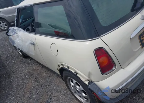 2004 Mini Cooper z USA, uszkodzony, nr VIN WMWRC33424TC53596